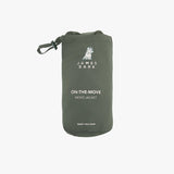 An olive green drawstring pouch with a white printed James Bark logo and text reading 'ON-THE-MOVE MEN'S JACKET' on a light gray background.