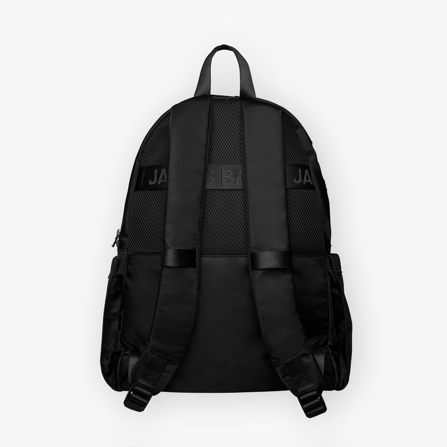 Back view of the black backpack showing padded mesh shoulder straps and a luggage strap
