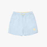 Light blue swim shorts with a yellow drawstring and a small yellow logo patch on the lower left leg