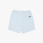 Light blue swim shorts with an elastic waistband, yellow drawstring, and a small black brand tag on the back pocket