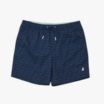 A pair of men's navy blue swim trunks featuring an all-over repeating monogram pattern, a white drawstring, and a small white embroidered logo on the lower left leg