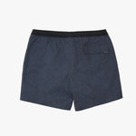 A pair of men's swim trunks in navy blue with a subtle tonal pattern, featuring a black elastic waistband and a side pocket