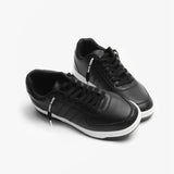 Pair of black leather sneakers with white soles with Black Laces