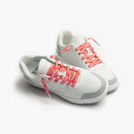 White Sneakers with Red Make Your Bark shoelaces