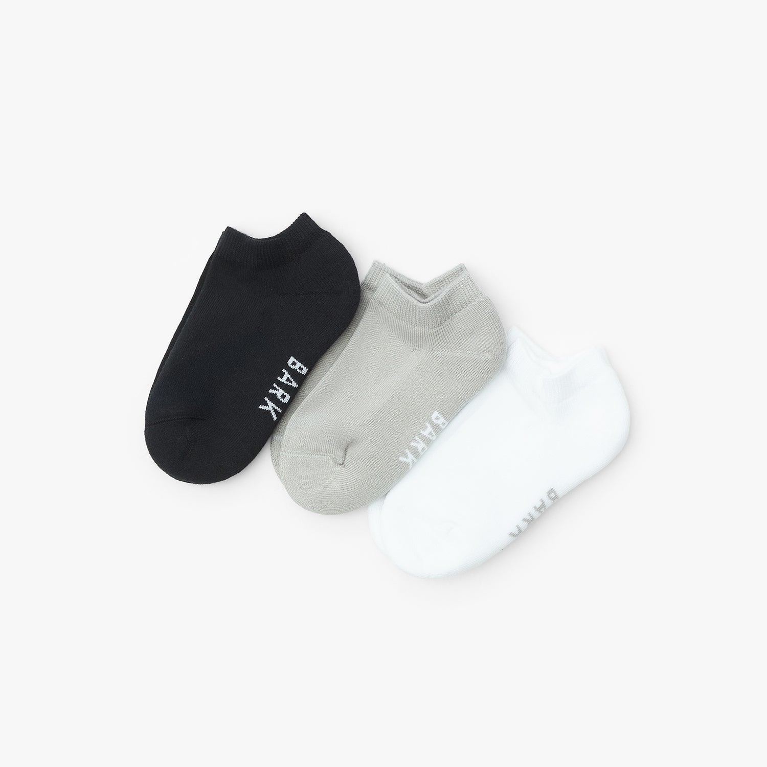 Two pairs of socks, one black and one gray, with 'Bark' branding on a white background.