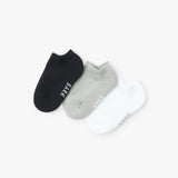 Two pairs of socks, one black and one gray, with 'Bark' branding on a white background.