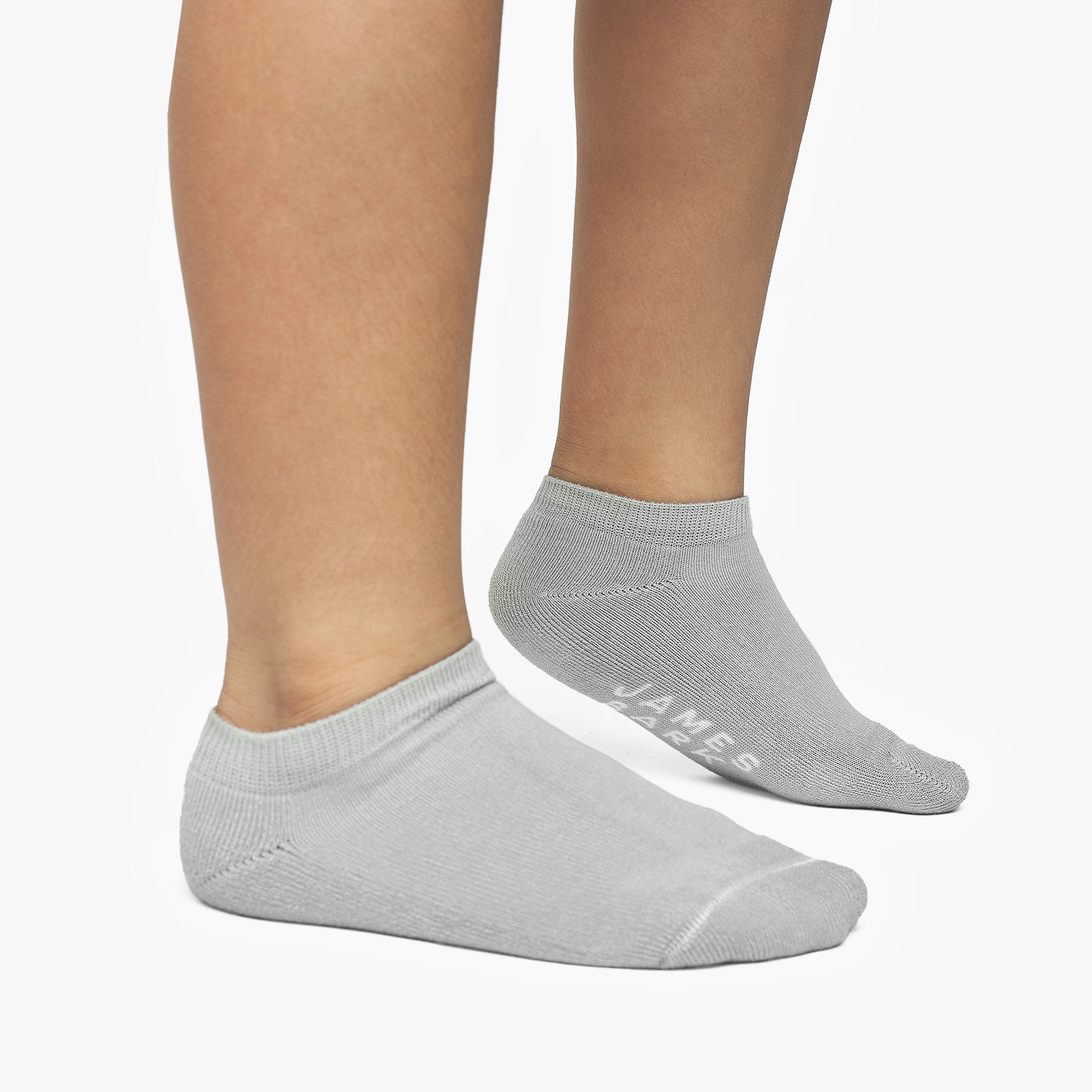 Gray ankle socks with a brand logo on a white background