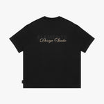 Black t-shirt with 'Elements Design Studio' text on a white background