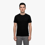Man wearing a black t-shirt on a white background