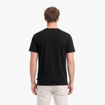 Man wearing a black t-shirt on a white background
