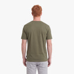 Man wearing a green t-shirt on a white background