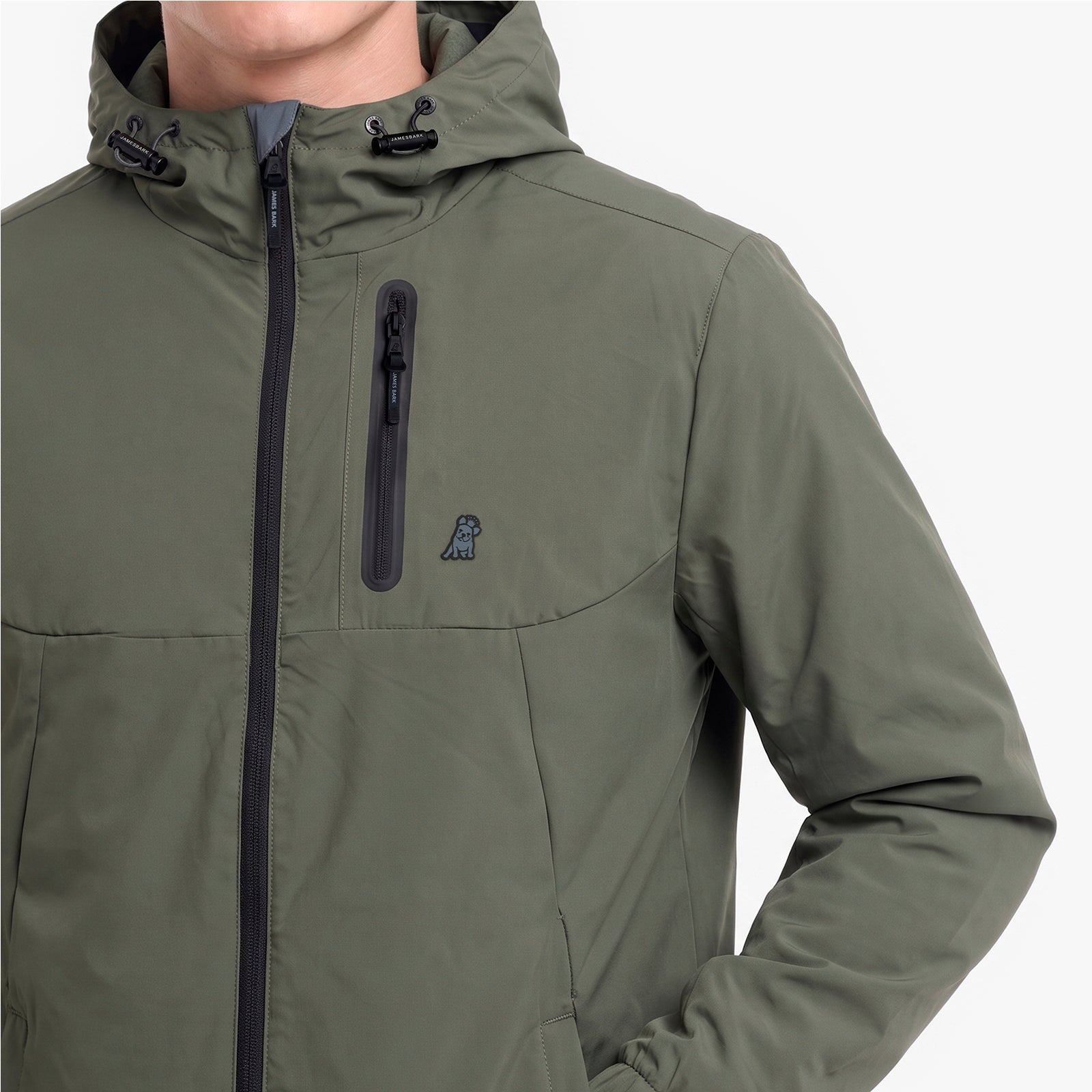 An olive green hooded jacket with a black front zipper and a vertical zippered chest pocket