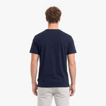 Man wearing a navy blue t-shirt on a white background