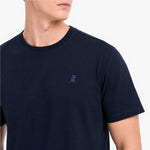Navy blue t-shirt with a small logo on a white background