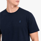 Navy blue t-shirt with a small logo on a white background