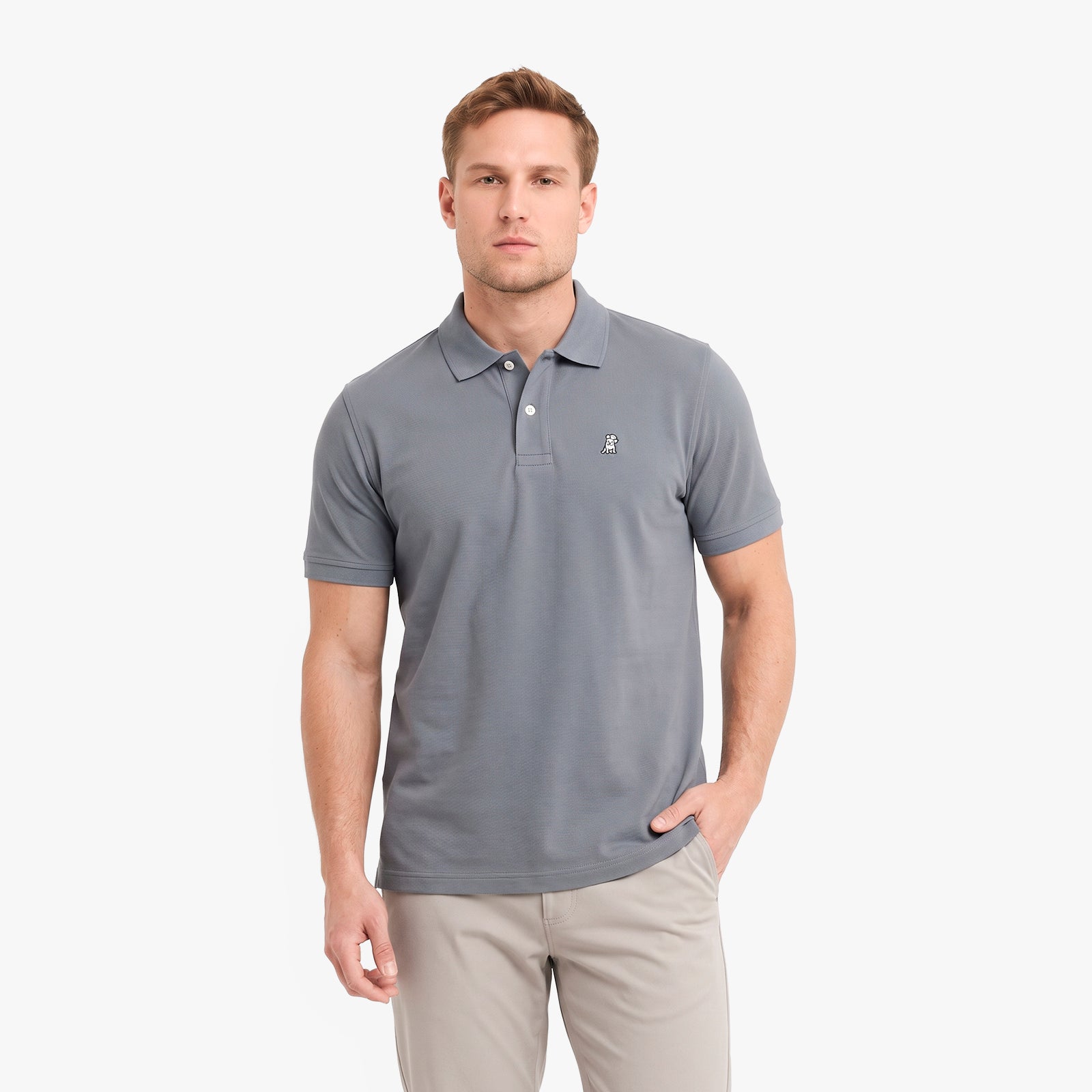 A man wearing a gray short-sleeve polo shirt with a small embroidered logo on the chest
