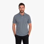 Men wearing a gray polo on a white background
