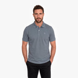 Men wearing a gray polo on a white background
