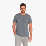 Man wearing a gray t-shirt on a white background