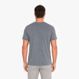 Man wearing a gray t-shirt on a white background