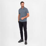 Man wearing a gray polo on a white background
