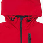 Close-up of the hood and upper chest of a red jacket. The hood has black toggles with black accents.
