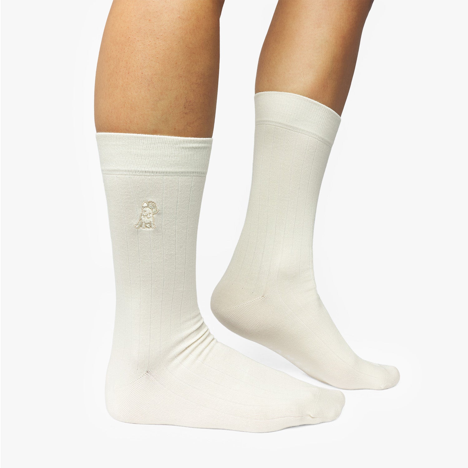 White socks with a small logo on a white background