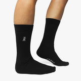 Black socks with a brand logo on a white background