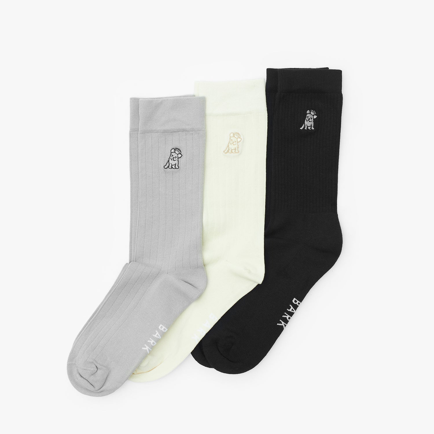 Three socks in gray, white, and black with a brand logo on a white background