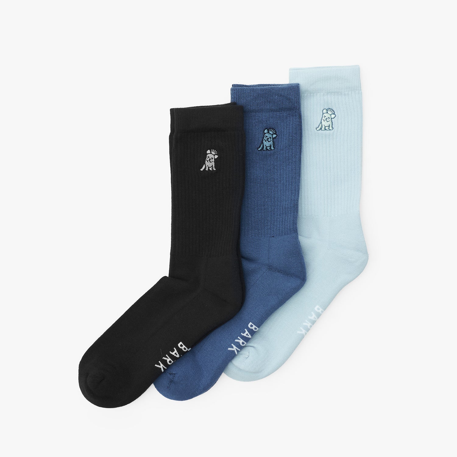 Three pairs of socks in black, blue, and light blue on a white background