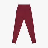 Maroon leggings on a light gray background