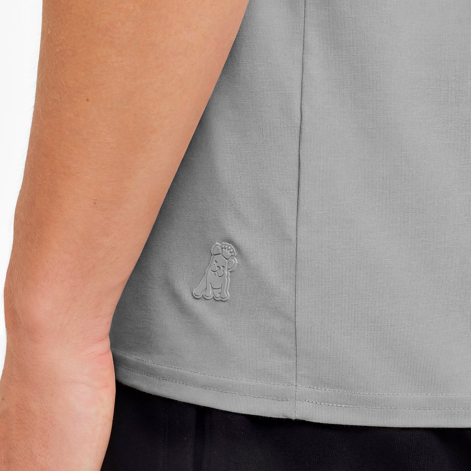 Gray sleeveless top with a logo on a person wearing it.