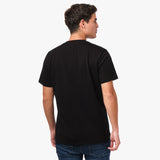 Person wearing a black t-shirt on a white background