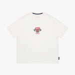 An off-white short-sleeve t-shirt, featuring a red and black racing graphic on the center chest with the text 'JAMES BARK' and checkered flags.
