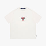 An off-white short-sleeve t-shirt, featuring a red and black racing graphic on the center chest with the text 'JAMES BARK' and checkered flags.