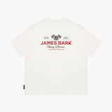 Back view of a white t-shirt, featuring a red and black racing graphic on the center chest with the text 'JAMES BARK' and checkered flags.