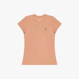 Peach-colored t-shirt with a small logo on a white background