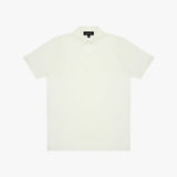 White polo shirt on a light beige background