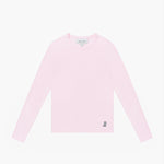 A flat lay shot of a light pink, long-sleeved crewneck t-shirt on a white background. A small, embroidered dog logo is on the bottom left hem.