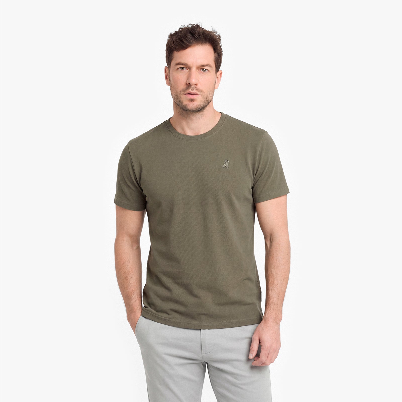 Man wearing an olive green t-shirt on a white background