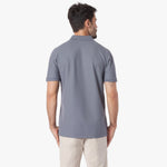 Back of a man wearing a gray polo shirt on a white background