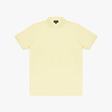 Light yellow polo shirt on a white background