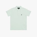 A light mint green polo shirt for kids, featuring a small embroidered logo on the left chest and a black brand label on the collar