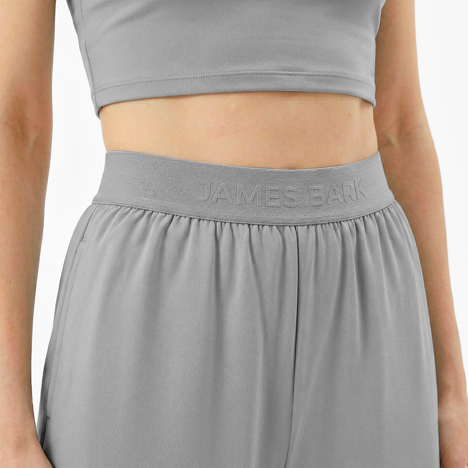 Gray athletic outfit with 'James Bark' branding on a plain background