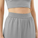 Gray athletic outfit with 'James Bark' branding on a plain background