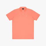Coral polo shirt on a light gray background