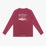 Back view of a maroon long-sleeve rashguard with white graphic design on a white background