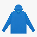 Blue rashguard with a small red logo on a light gray background