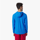 Back view of a man wearing a blue rashguard