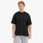 Person wearing a black t-shirt with a logo on a white background